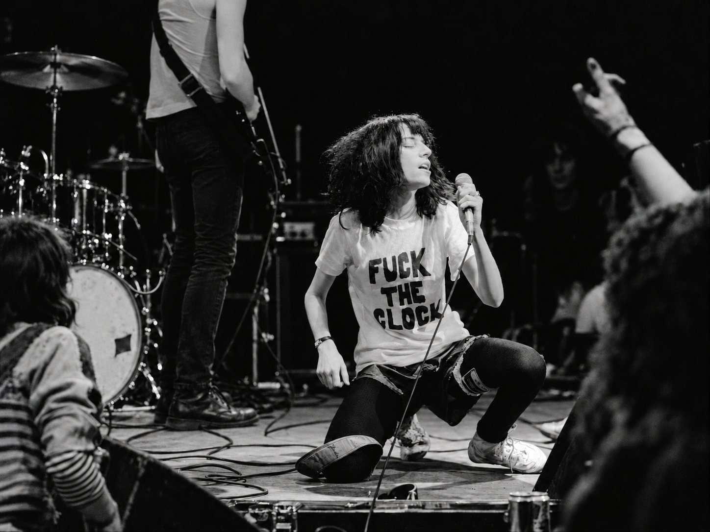 Patti Smith wearing a Fuck the Clock T-shirt, photographed by Allan Tannenbaum, 1978